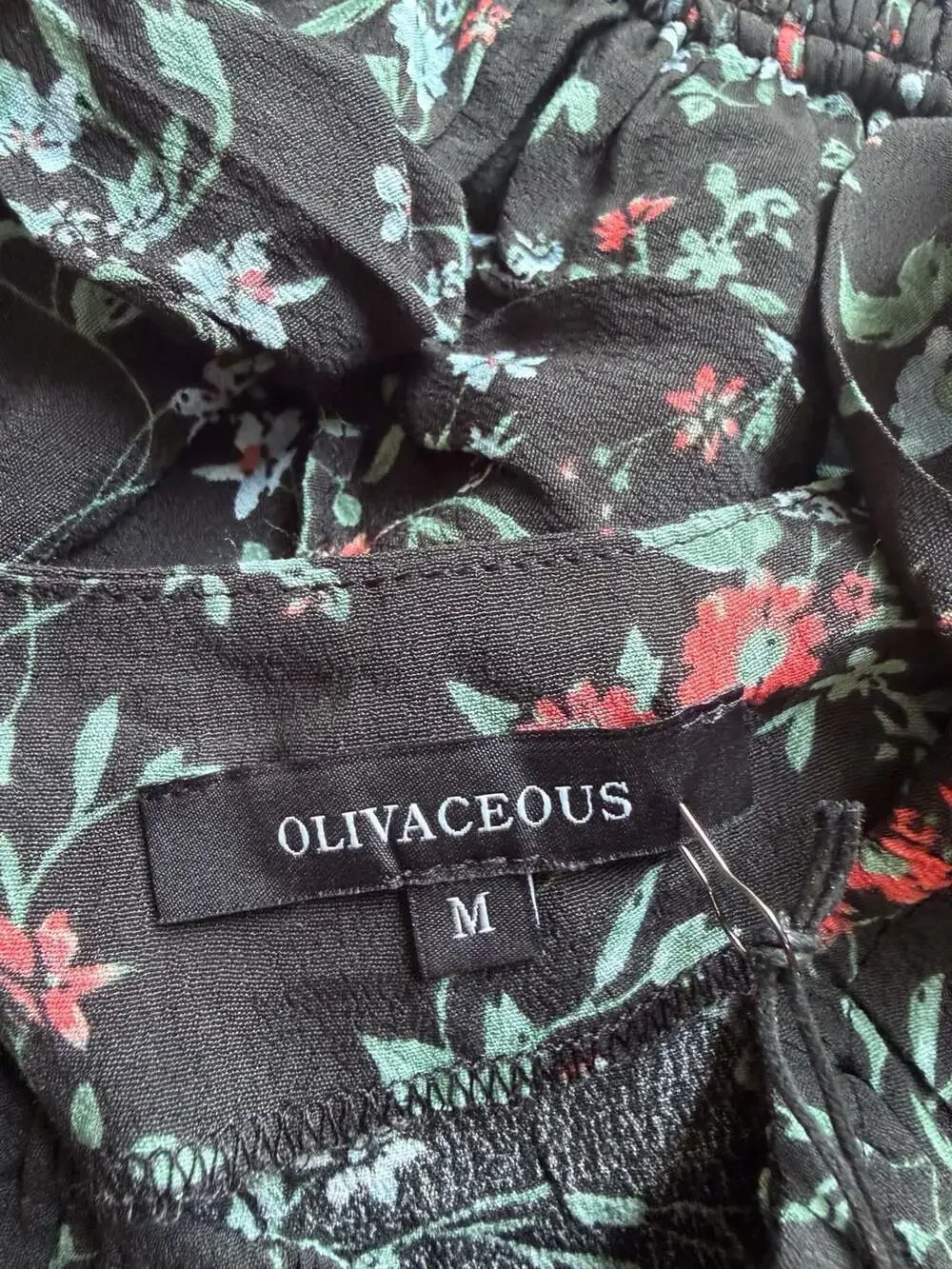 Olivaceous Black Floral Two-Piece Set with Smocked Ruffle Skirt and Crop Top